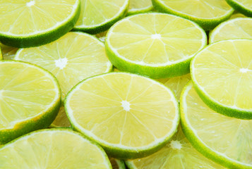 Fototapeta premium Lime slices as background