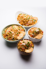 Bhelpuri Chaat/chat is a road side tasty food from India, served in a bowl or plate. selective focus