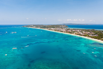 Fototapeta na wymiar Sulu Sea, view of the island of Boracay, Philippines. Seascape, blue sea and a large densely populated island, aerial view.