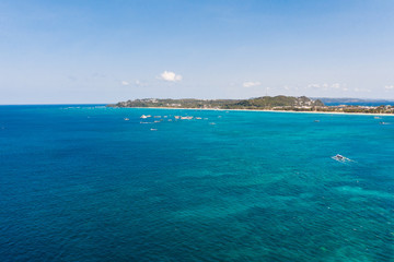Sulu Sea, view of the island of Boracay, Philippines. Seascape, blue sea and a large densely...