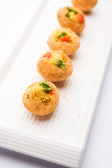 Sev puri - Indian snack and a type of chaat. Popular in Mumbai/pune from Maharashtra. it's a roadside food also served as a starter in restaurants
