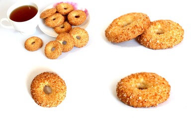 A variety of shaped cookies. White cup of tea. Morning is sweet. Tea ceremony.