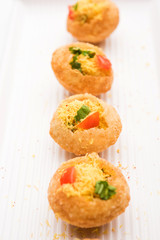 Sev puri - Indian snack and a type of chaat. Popular in Mumbai/pune from Maharashtra. it's a roadside food also served as a starter in restaurants