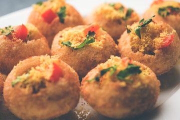 Sev puri - Indian snack and a type of chaat. Popular in Mumbai/pune from Maharashtra. it's a roadside food also served as a starter in restaurants