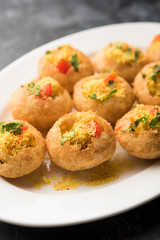 Sev puri - Indian snack and a type of chaat. Popular in Mumbai/pune from Maharashtra. it's a roadside food also served as a starter in restaurants