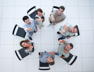 top view.creative business group pointing to you