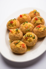 Sev puri - Indian snack and a type of chaat. Popular in Mumbai/pune from Maharashtra. it's a roadside food also served as a starter in restaurants