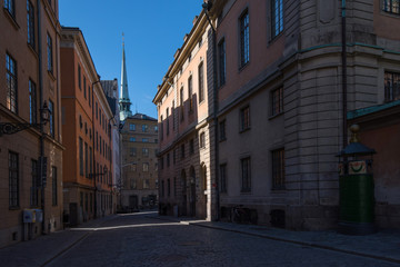 Naklejka na ściany i meble Streets and alleys in the old town, Gamla Stan, in Stockholm an early summer morning
