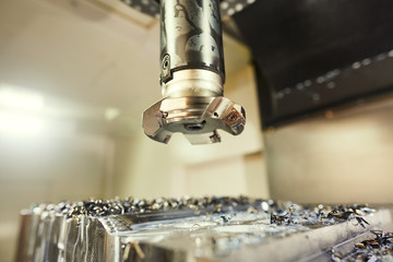 milling cnc machine at metal work industry. Multitool precision manufacturing and machining