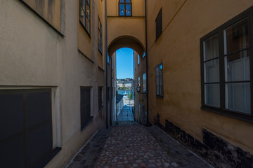 Arch view at the island Riddarholmen in Stockholm a summer morning