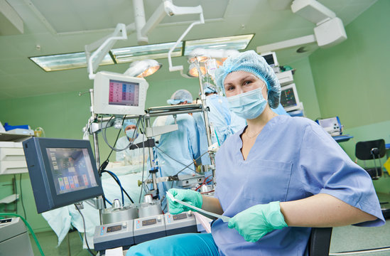 surgery nurse working during operation
