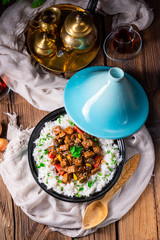 Tajin beef stew with rice paprika and sesame seeds