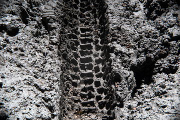 offroad car tire tracks detail on mud