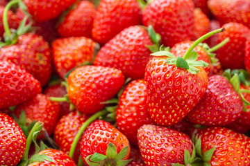 Fresh organic red ripe Strawberry fruit background closeup