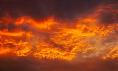 Fototapeta na wymiar Beautiful fiery, orange and red, sunset sky. Evening Magic Scene. Composition of nature