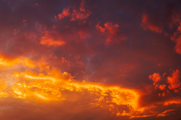 Beautiful fiery, orange and red, sunset sky. Evening Magic Scene. Composition of nature