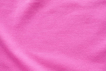 Tuinposter Pink cotton fabric texture closeup background © Piman Khrutmuang