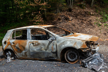 Carbonized car. Completely burnt out and carbonised car