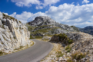 Mountain landscape in the summer day. Mountain road. Soft focus and blurred background.