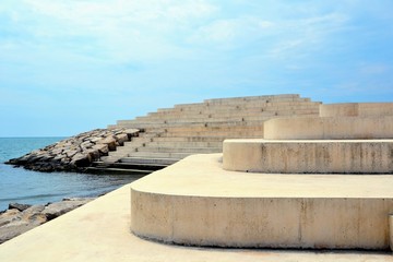 Fototapeta premium Sphinx of Durres (Sfinksi) called also Urban Cape at Durres town, Albania. Seaside large steps, stairs at the embankment, popular tourist place, viewpoint