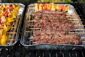  grilling meat and vegetables outdoor