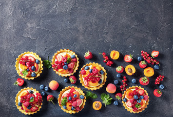 sweet french dessert - tarts with berry and fruit