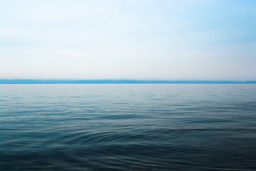 Obraz premium Lake Baikal on a sunny day. Clear blue sky and water. Free space for text. Background for design, screen saver