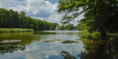 Fototapeta na wymiar Hermsdorf Castle . Castle on the lake near Dresden, Germany, Europe