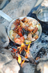 Preparing cooking breakfast in camping at forest.