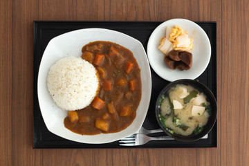 Curry rice , Japanese food on wooden table