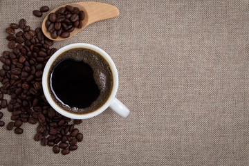 coffee cup on sackcloth background
