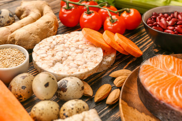 Different healthy food on wooden table