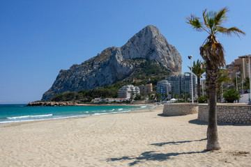 Sand beach and Natural Park of Penyal d'Ifac on background, Calpe, Spain