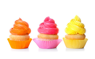 Sweet tasty cupcakes on white background