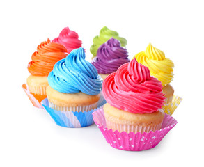 Sweet tasty cupcakes on white background
