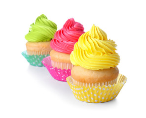 Sweet tasty cupcakes on white background