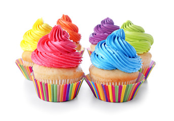 Sweet tasty cupcakes on white background