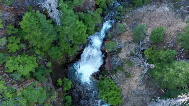 Close up of waterfall tilt up shot