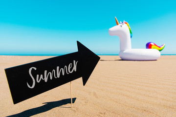 text summer and unicorn on the beach