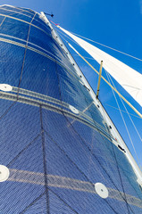 Sail of a Catamaran sailing boat against clear blue sky