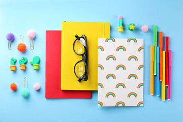 Back to school concept. Set of different school supplies, notebook, pen, accessories on paper textured background. Various scolorful stationery items. Close up, copy space, top view, flat lay.