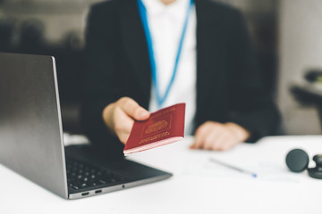 Fototapeta premium visa officer puts a stamp in the passport