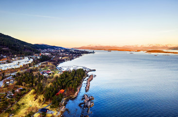 Aerial view of residential area in Molde, Norway in the evening. Beautiful fjord