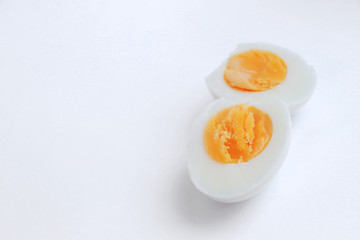 Background with cut egg and solar yolk