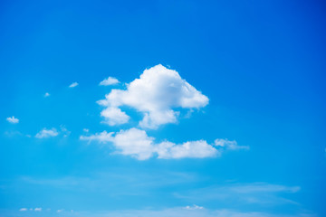 The white clouds in the sky background