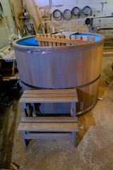 Oak barrels for a bathing with herbs in the workshop.