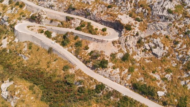 Aerial View of Loopy Road, The Road is Located in Mallorca Spain, Cars Going up. Knotted Tie Road. Nudo de la Corbata,