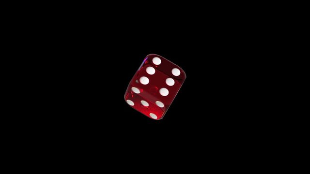 Zoom on red transparent plastic playing dice; rotating on black background.