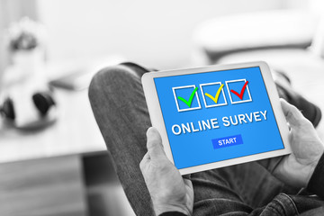 Online survey concept on a tablet