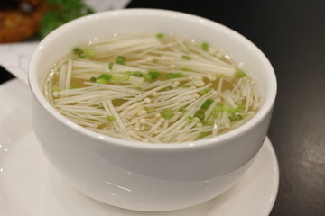 boiled water of gold needle mushroom.